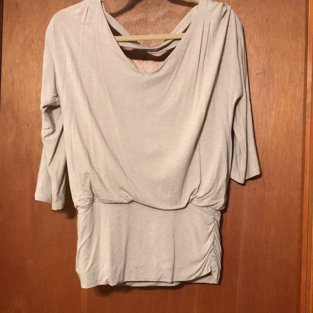 Tan and white striped blouse
